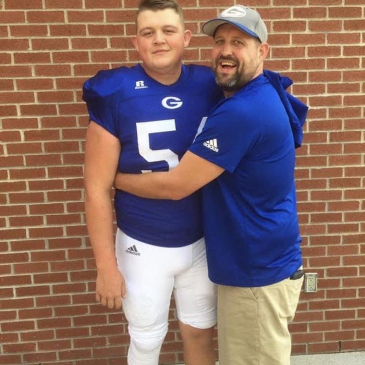 Hunter and our officiant Brad. GO BIG BLUE