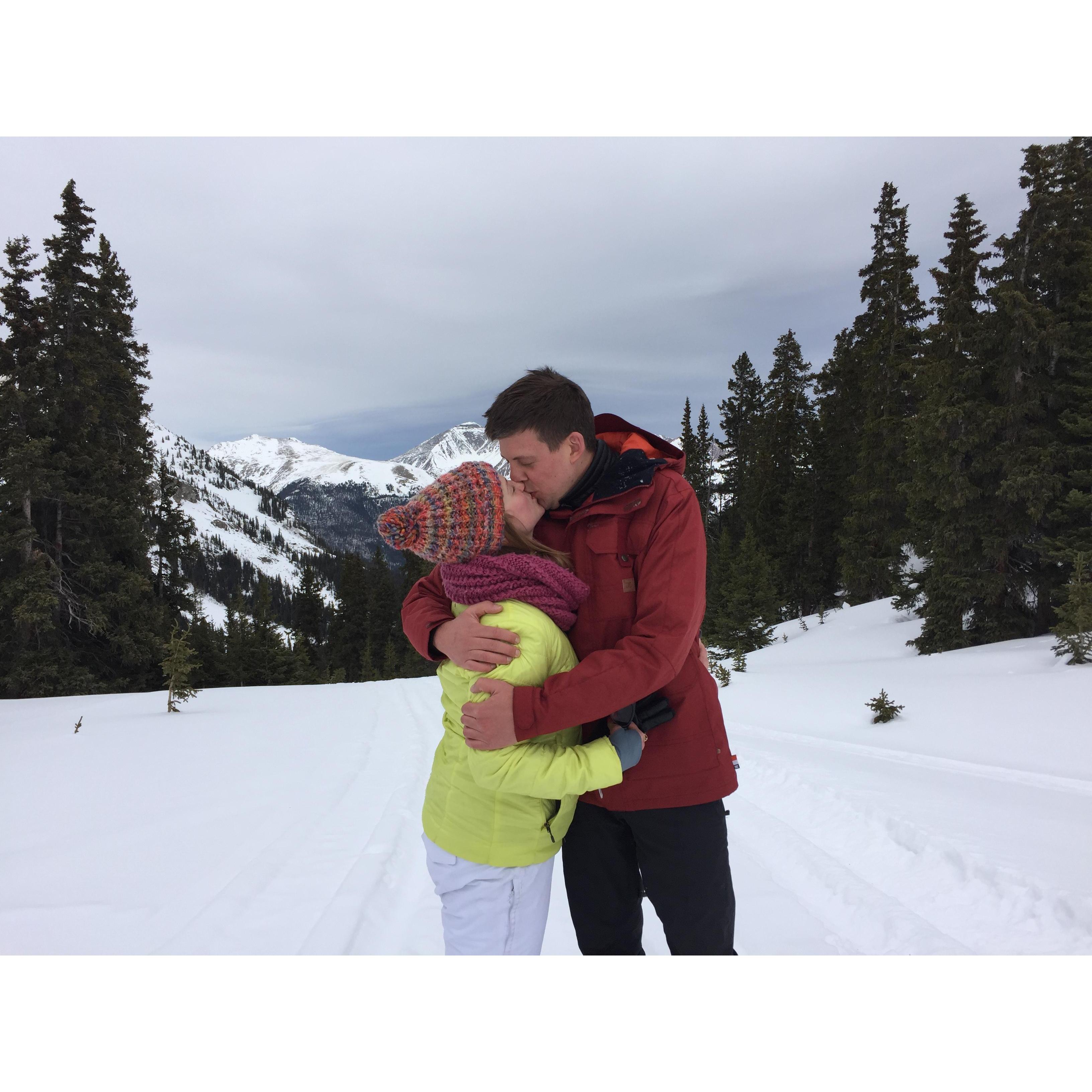 They first said, "I love you" in the mountains in Breckenridge, CO after they fell off a snow mobile. For the record, Kara said it first.