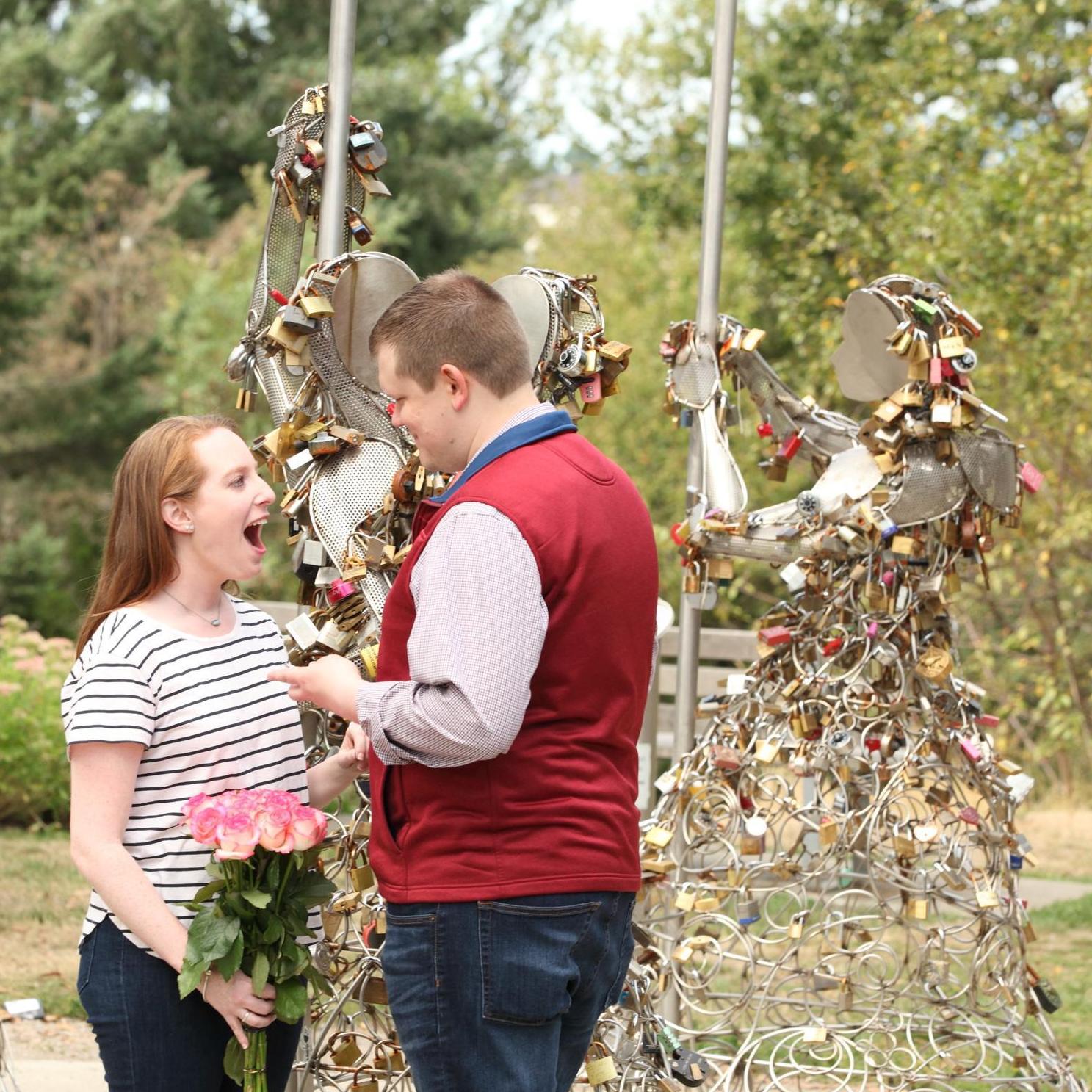 After we got engaged, we 'wandered' upon these statues of dancers full of locks. I remember saying "we need to bring back a lock!" Next thing I knew, he pulls a lock from his pocket! I was shocked!!