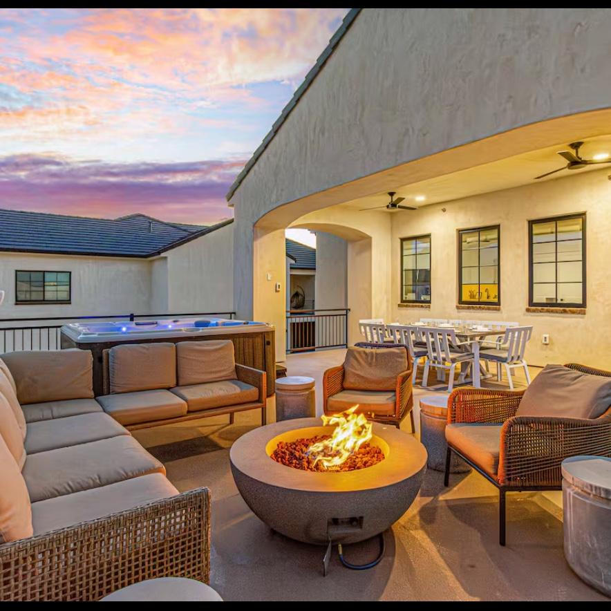 Plenty of outdoor seating, plus a hot tub on the balcony