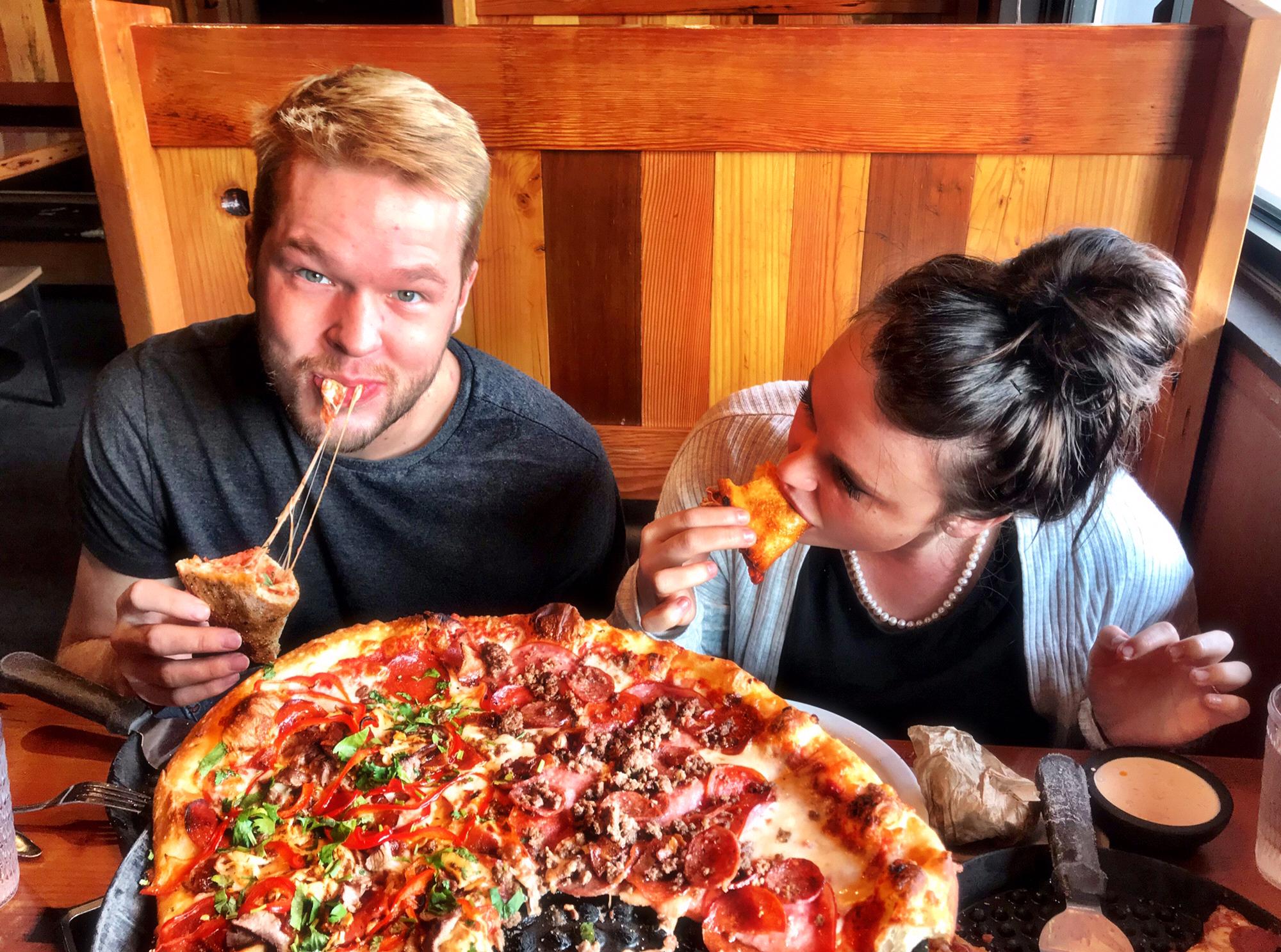 My mom took this picture of us at Moose’s Tooth Pizza jn Alaska!