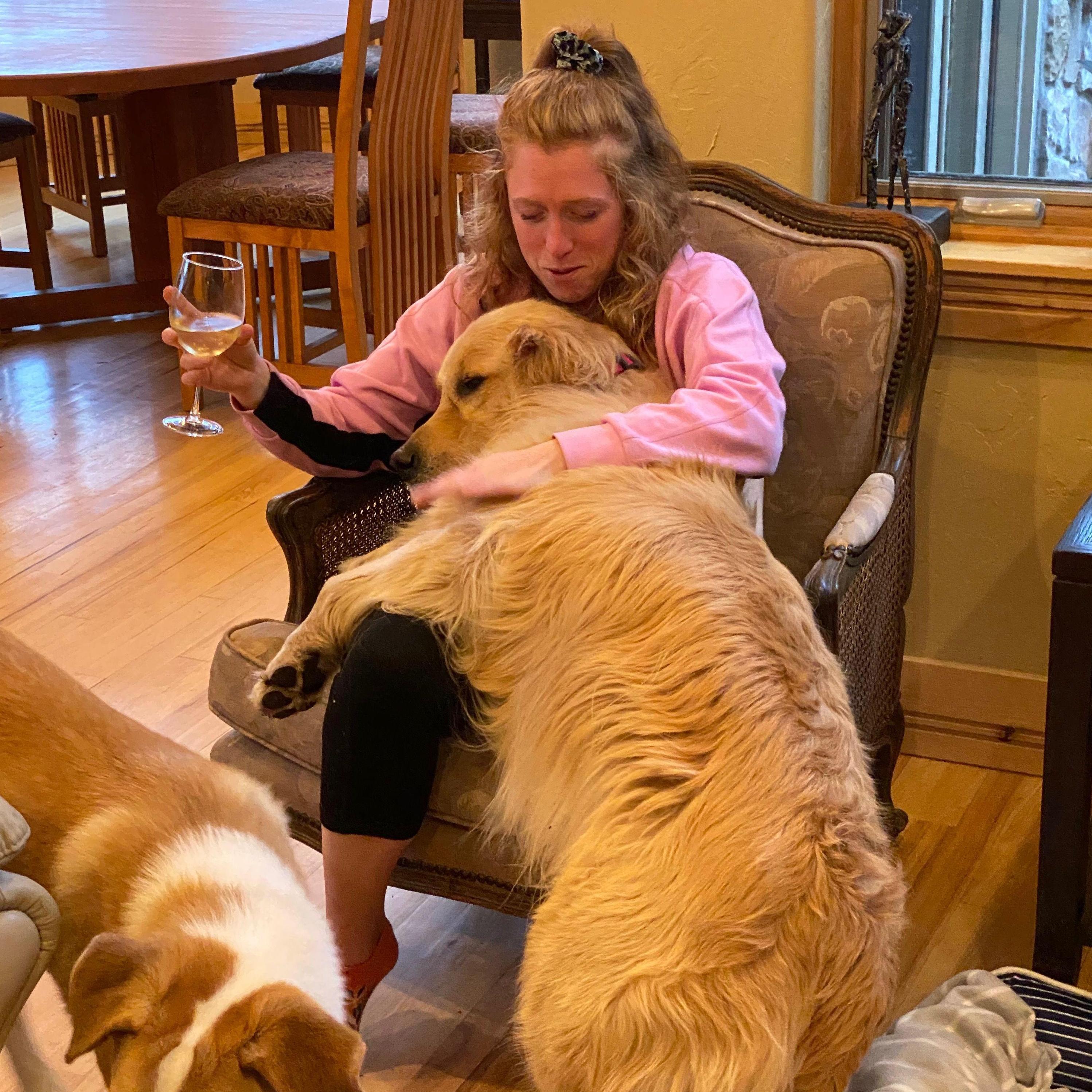 For Andrea, no dog is ever too small...or big. Her cousins also love her back.