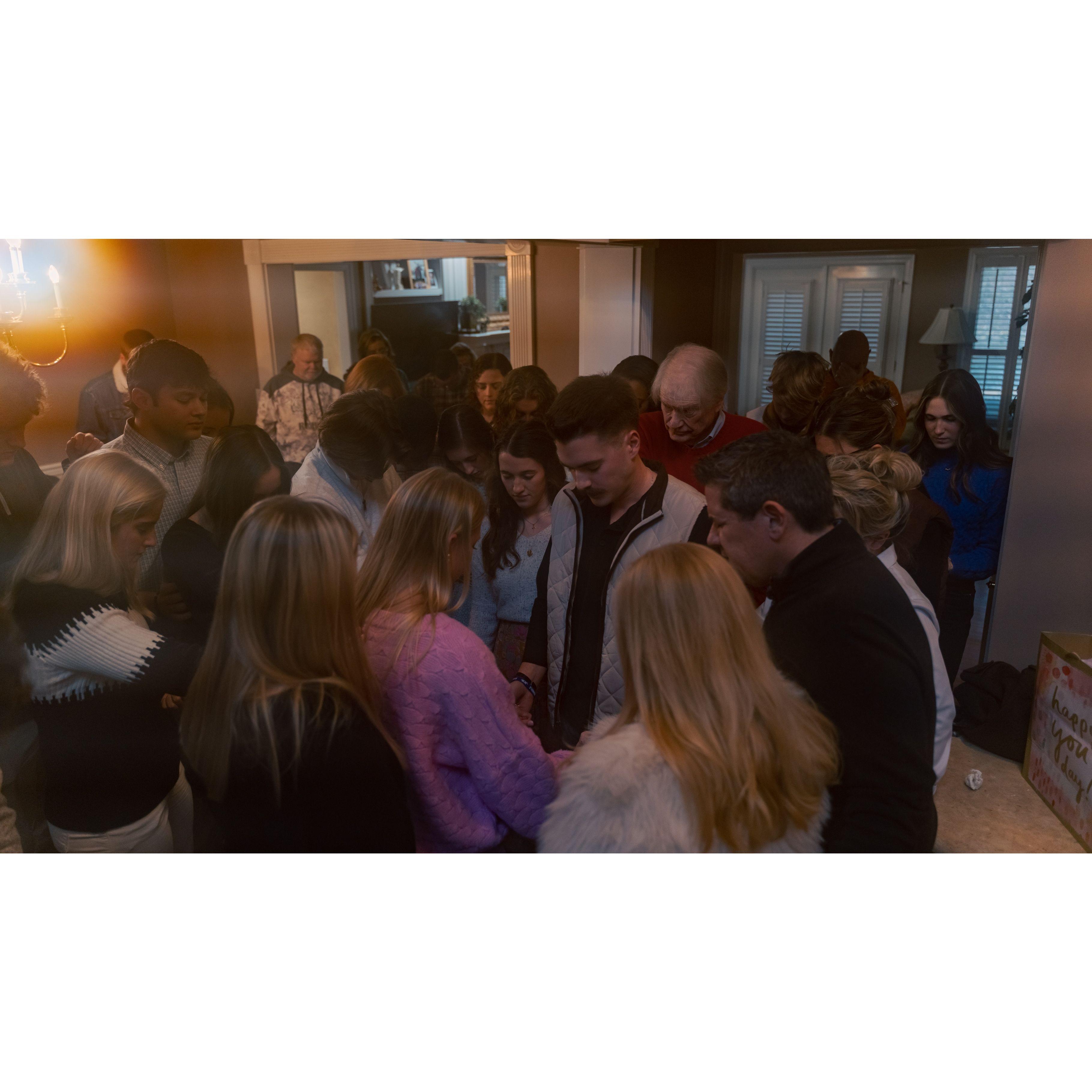 Our families and freinds praying over us after we got engaged!