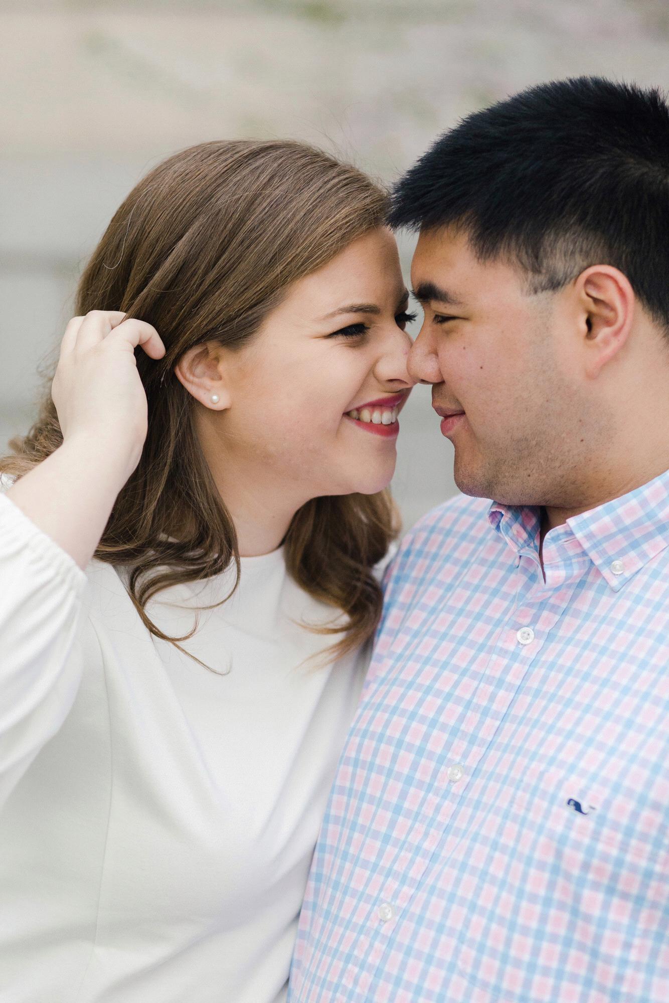 Cherry blossom engagement pictures at the Basilica of the National Shrine of the Immaculate Conception, March 2020. (Kate Grace Photography)