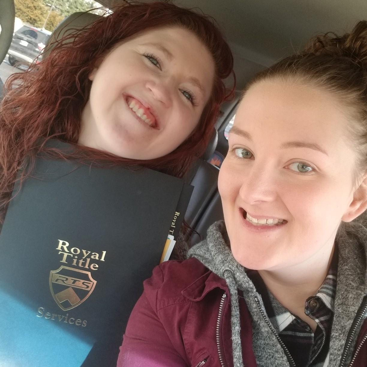 The day we signed on our first home together!