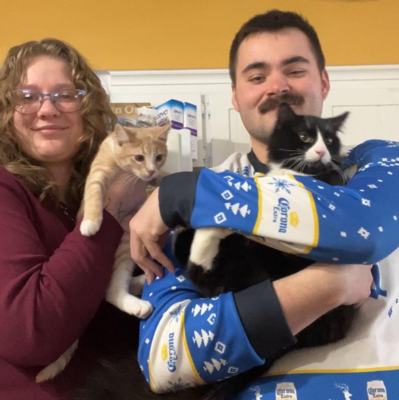 Hannah with Cheese, Nick with Gibby. Our tactical kitties. Our family Christmas photo that never got sent out to anyone.