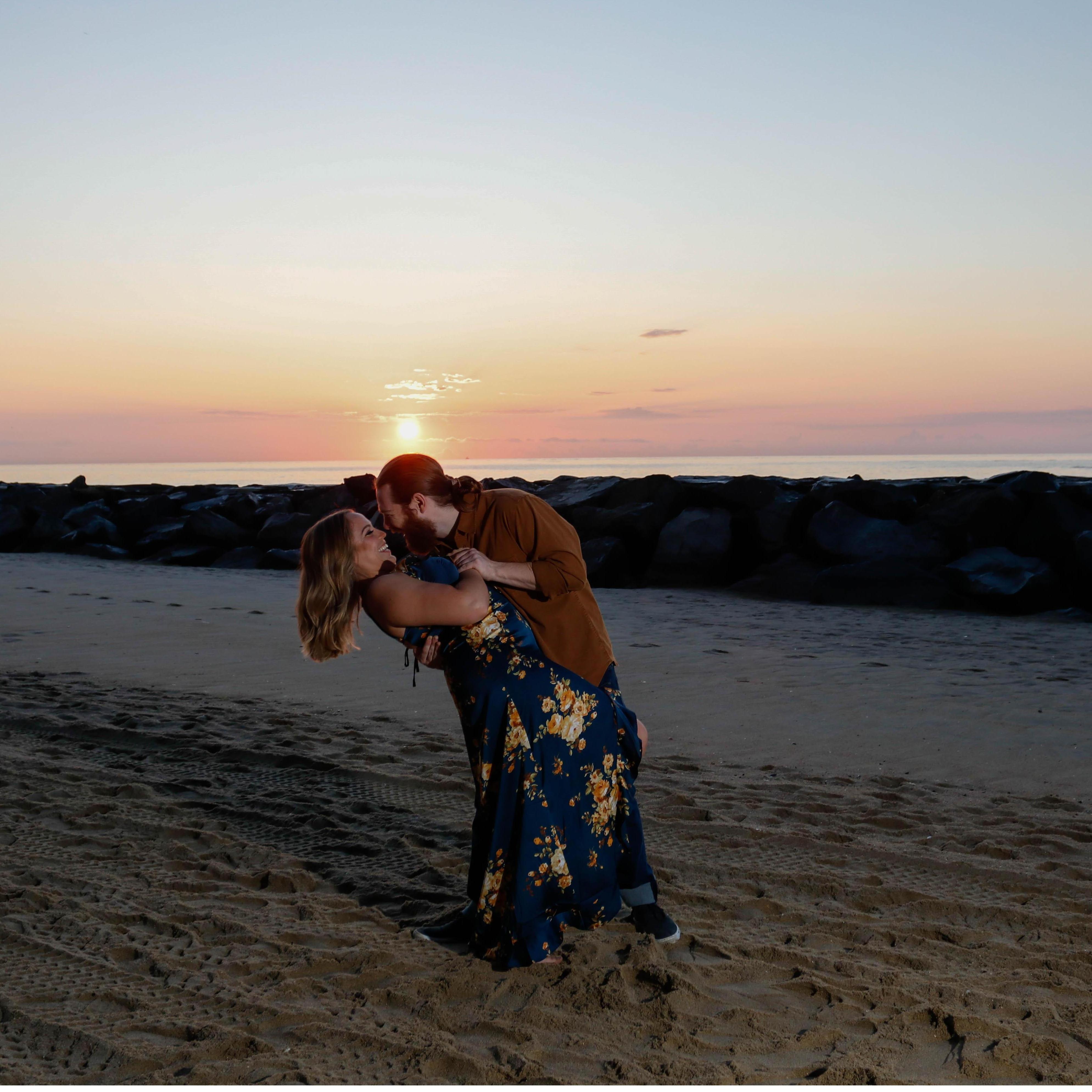 our attempt at "the dip" during our engagement shoot at Asbury Park beach!