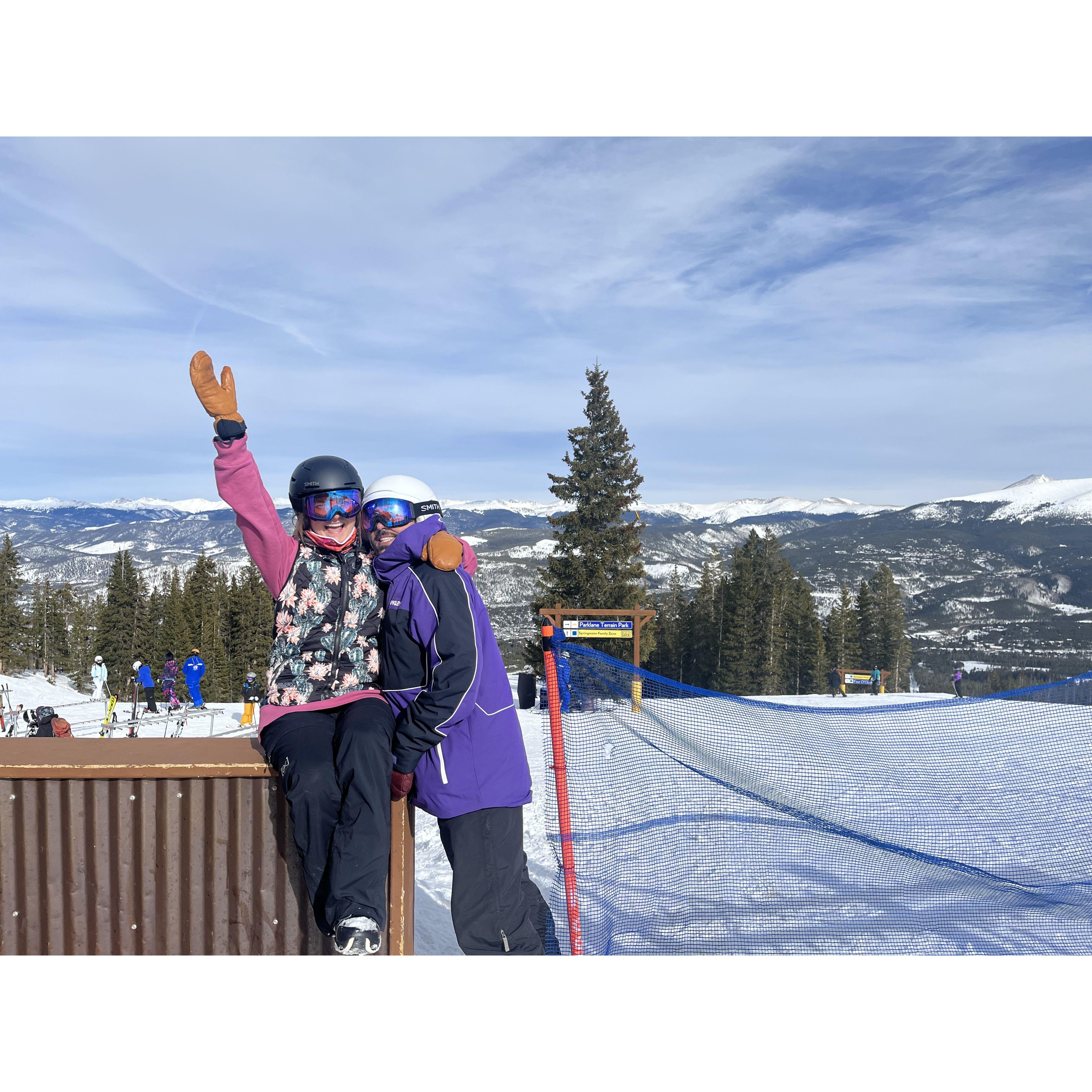 At the top of Breckenridge snowboarding together. The best time for a mountain beer!