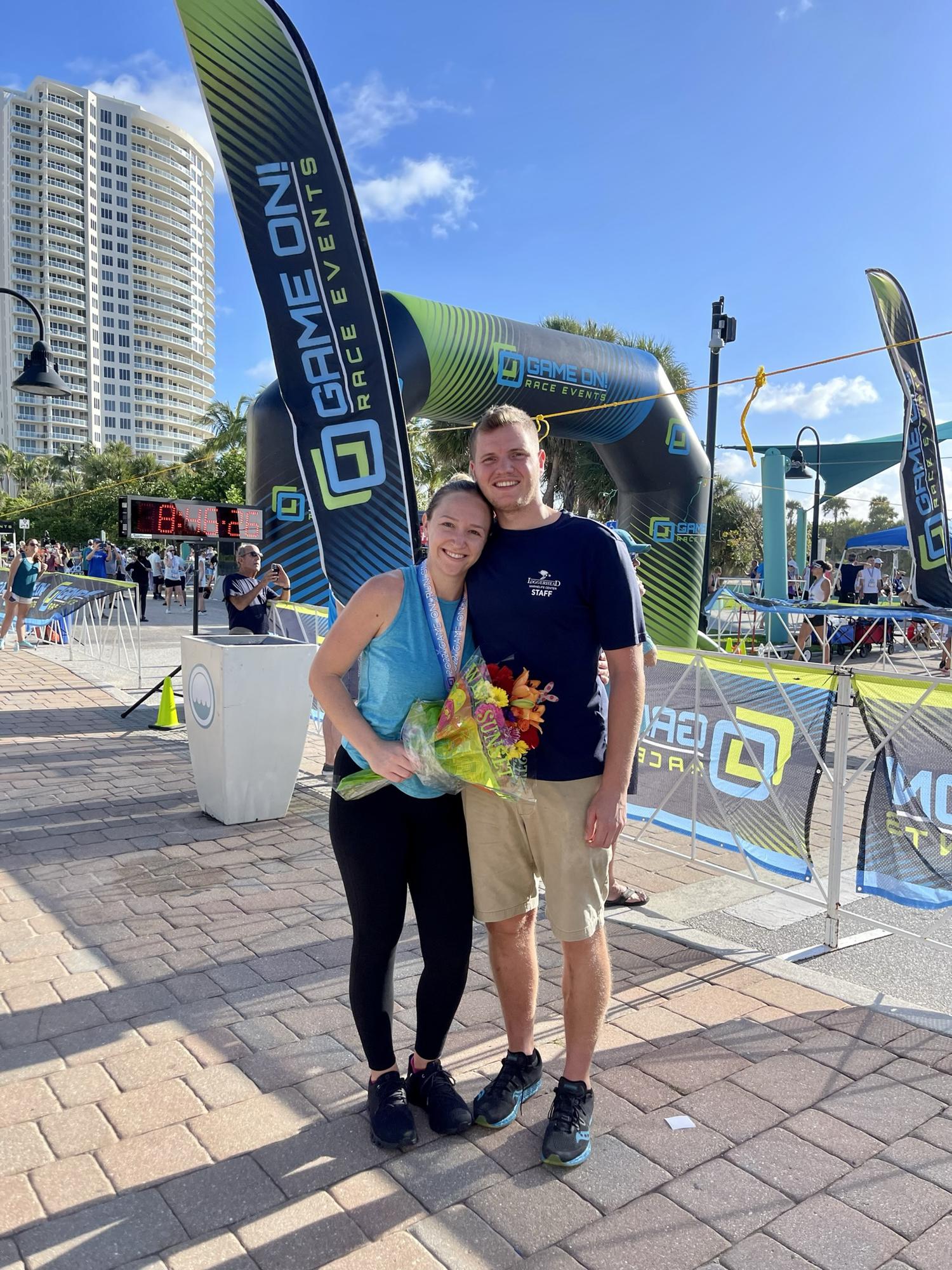 Carter supporting Emily at one of her half marathons!