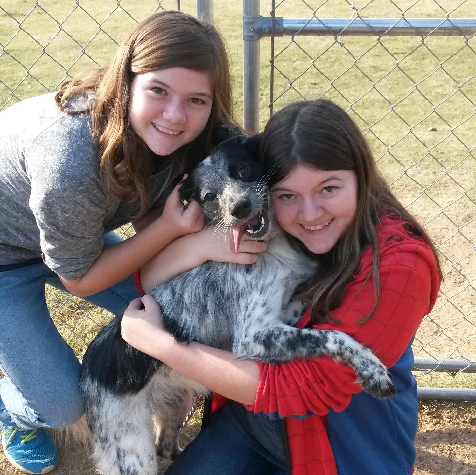 Emily and Kaitlyn with their dog, Ollie