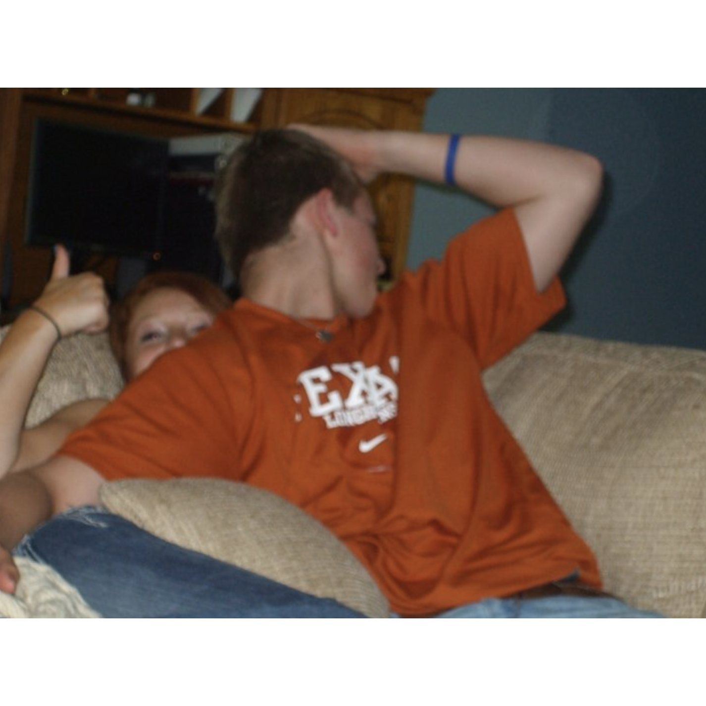 Our first photo together in 2010. Was Russ embarrassed to be seen with a JUNIOR? Looks like it.