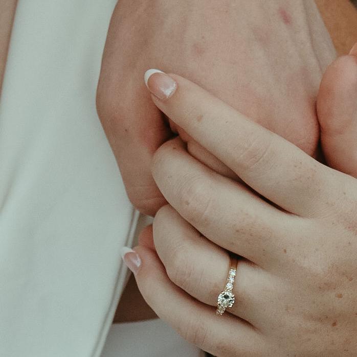 The ring!!! Made with diamonds from the mother of the brides engagement ring!