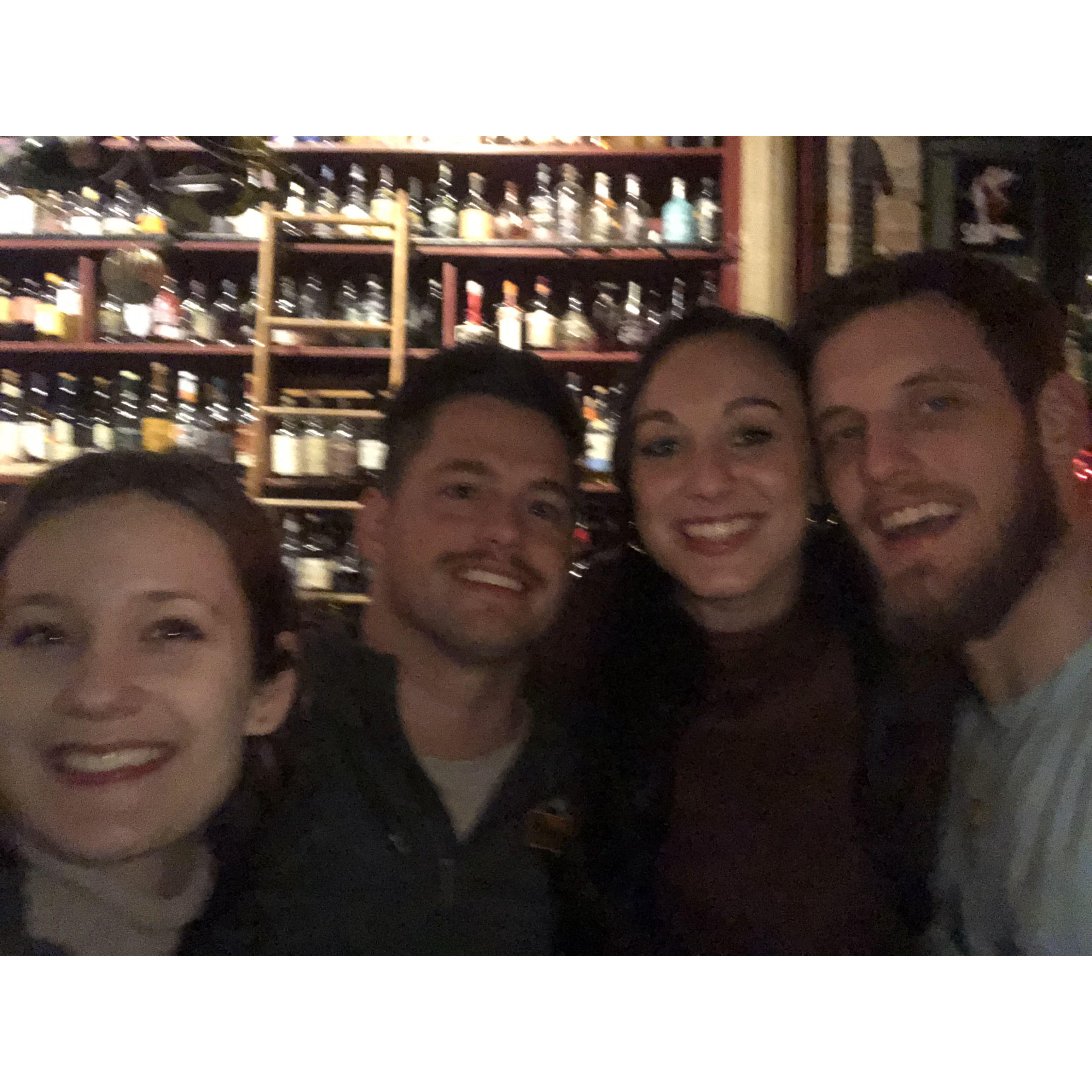 Timmy's brother and sister, all of us in New York at a bar