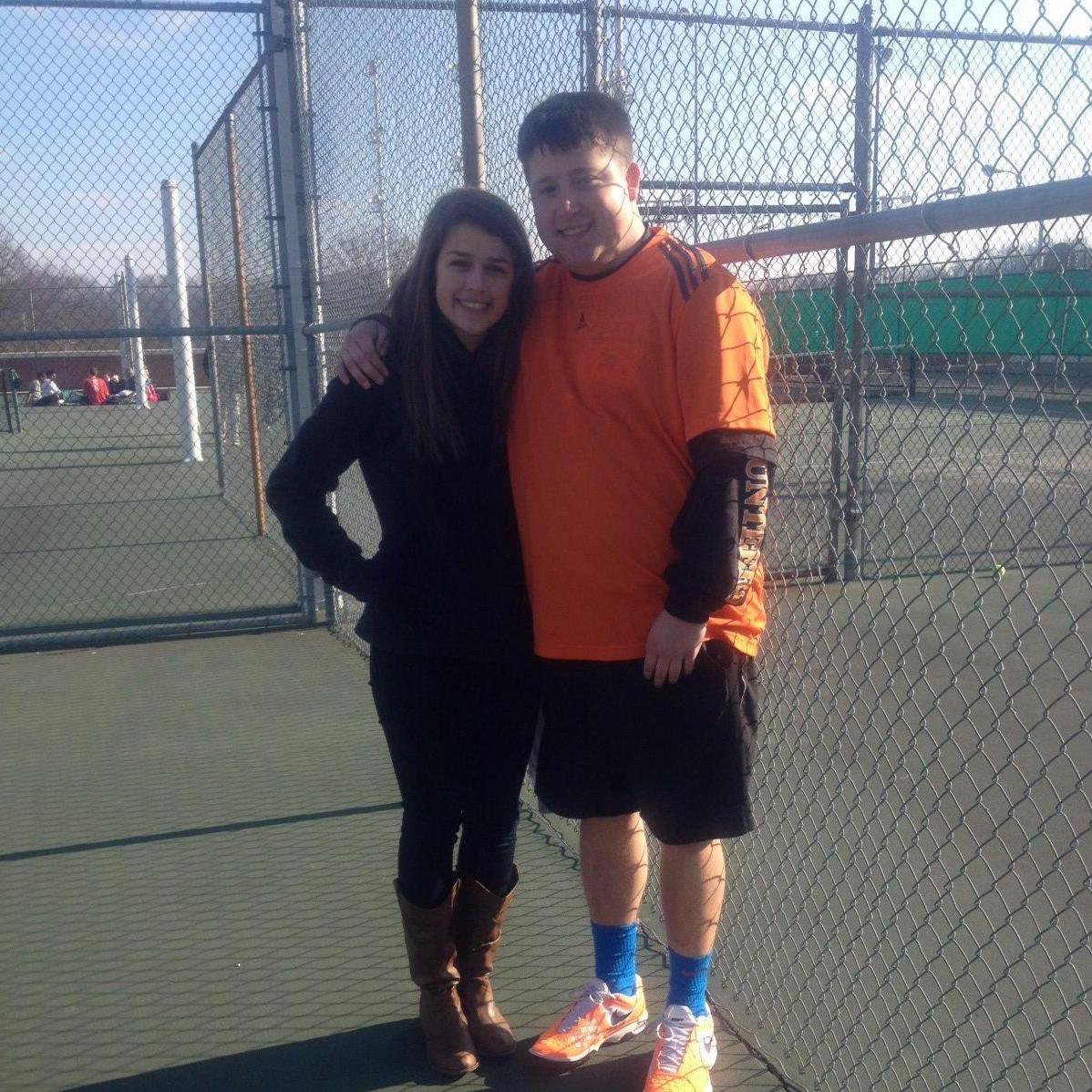 Cheering on Mason during one of many tennis matches