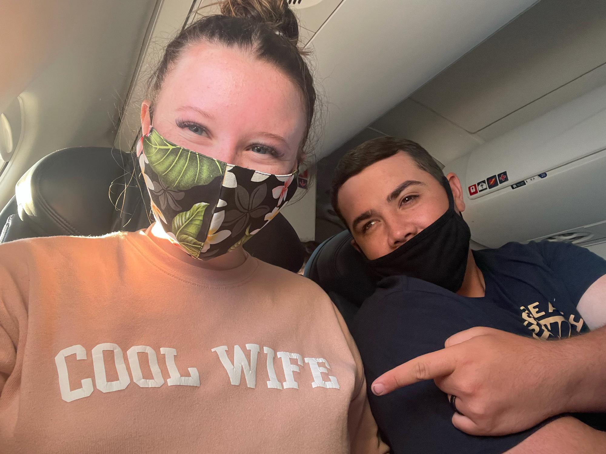 Dustin and Maya on their flight back home to Portland, OR after eloping on vacation in Hawaii 2021