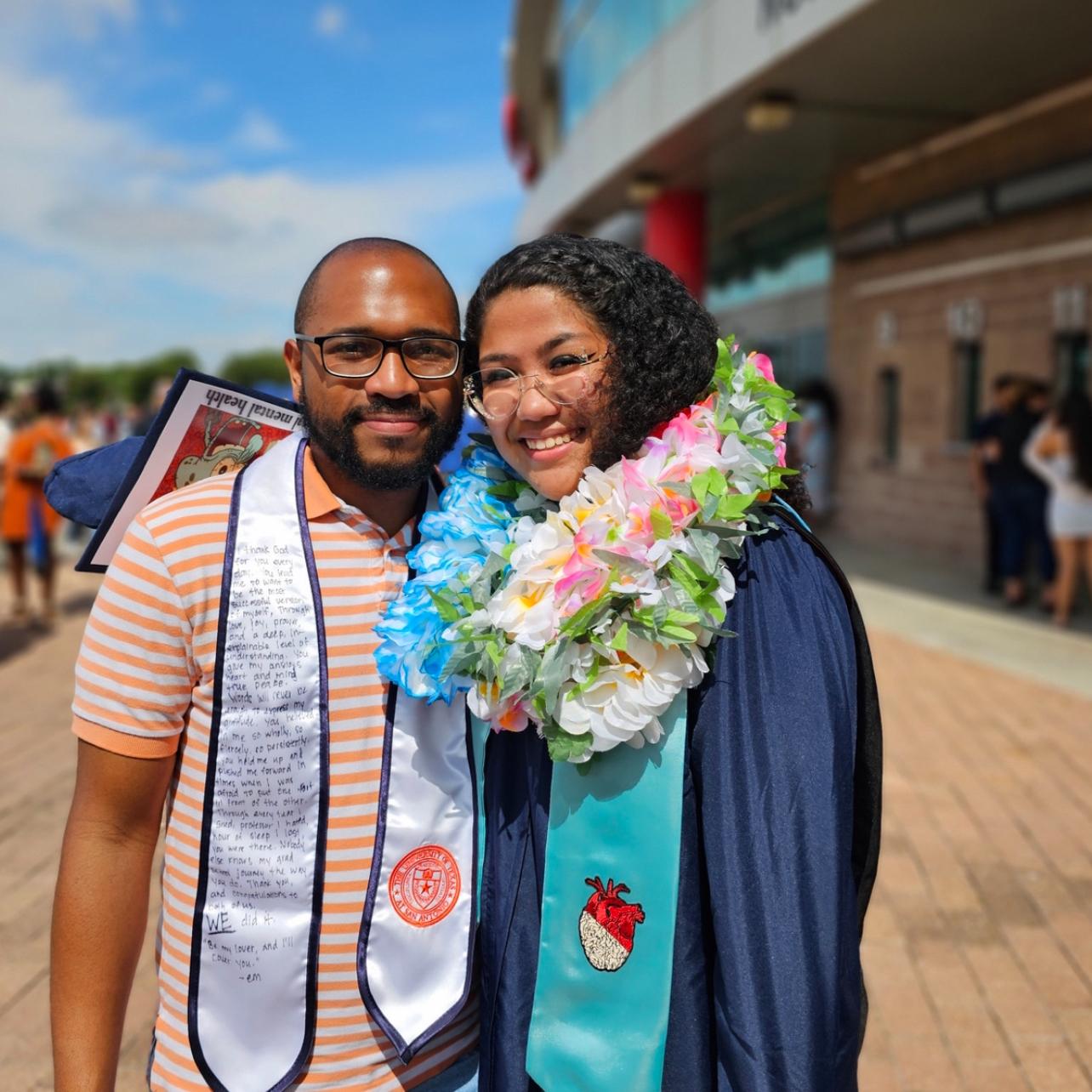 It takes TWO! Emily and jordan celebrating her master’s degree graduation