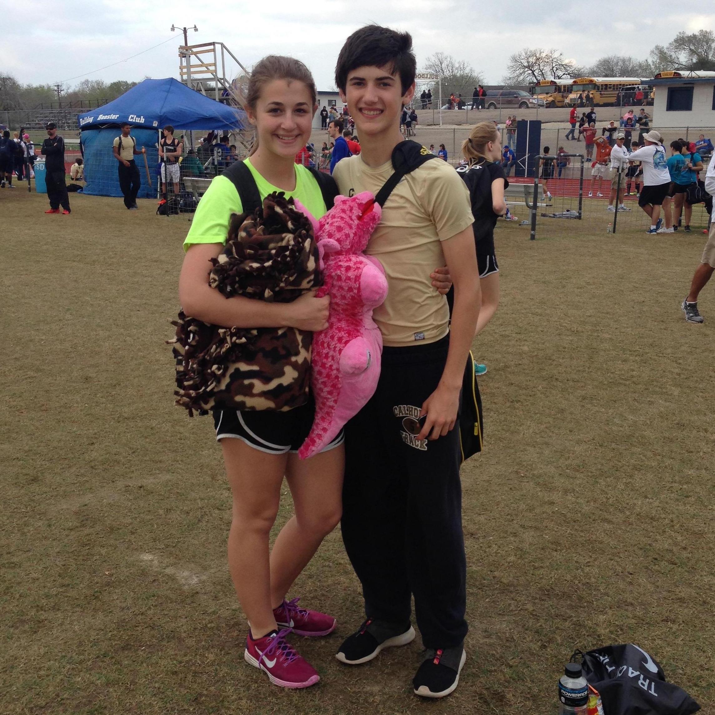 Gotta love those high school track meets ;) John ran the 1 mile and 2 mile and Jessamy did high jump and triple jump.