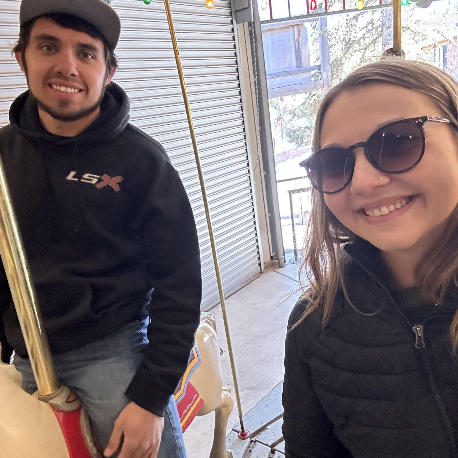 March 2023. Riding the carousel at Cheyenne Mountain Zoo.