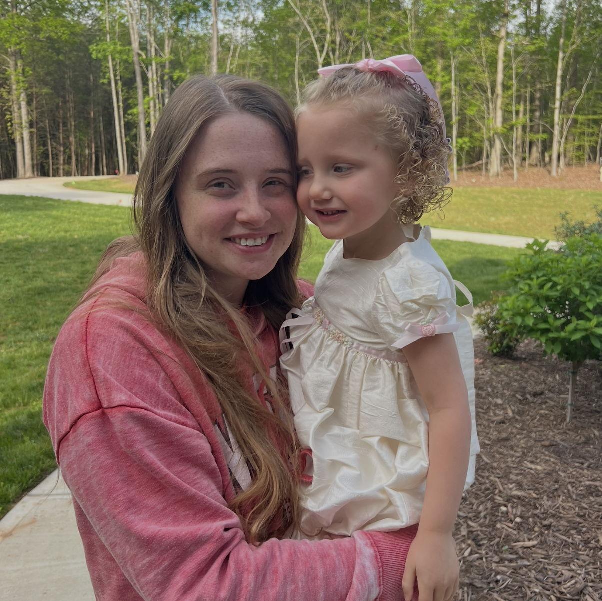 Brynlee is wearing Austin's dress that she wore when she was a little girl