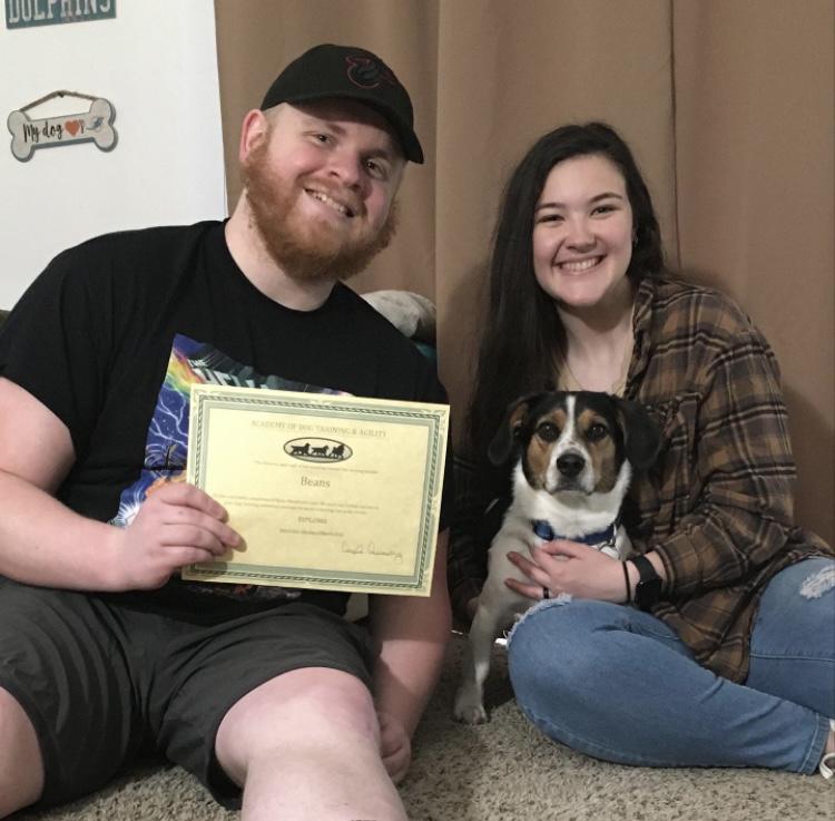 Bean graduates from school (2022).