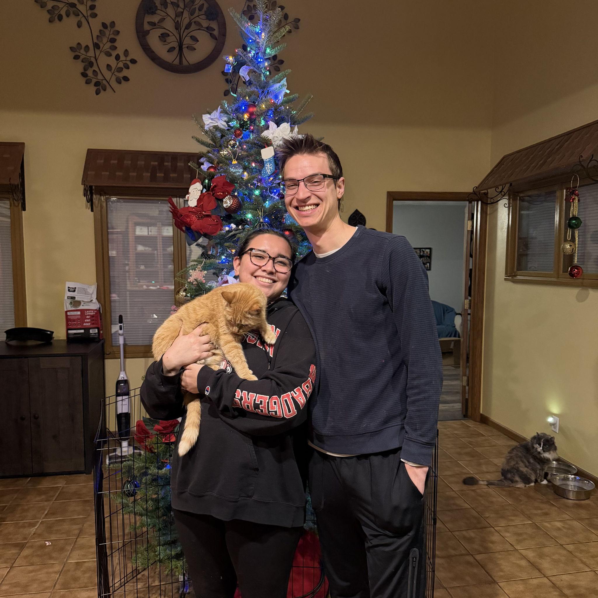 Our cute little family and first Christmas engaged!