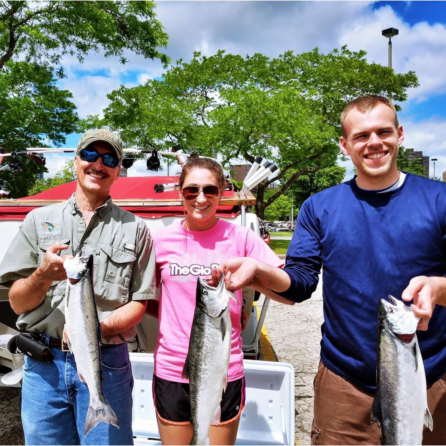 There have been multiple attempts to get Jacqui to fish. This was from a Father's Day venture on Lake Michigan with both Brad and Jacqui's dads!