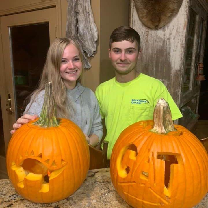 Pumpkin carving with his brothers for Halloween!
