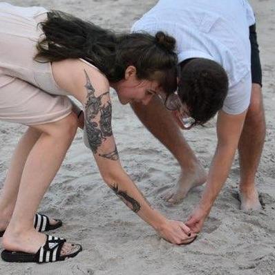 Rescuing a tiny crab. Bald Head, North Carolina 2018.