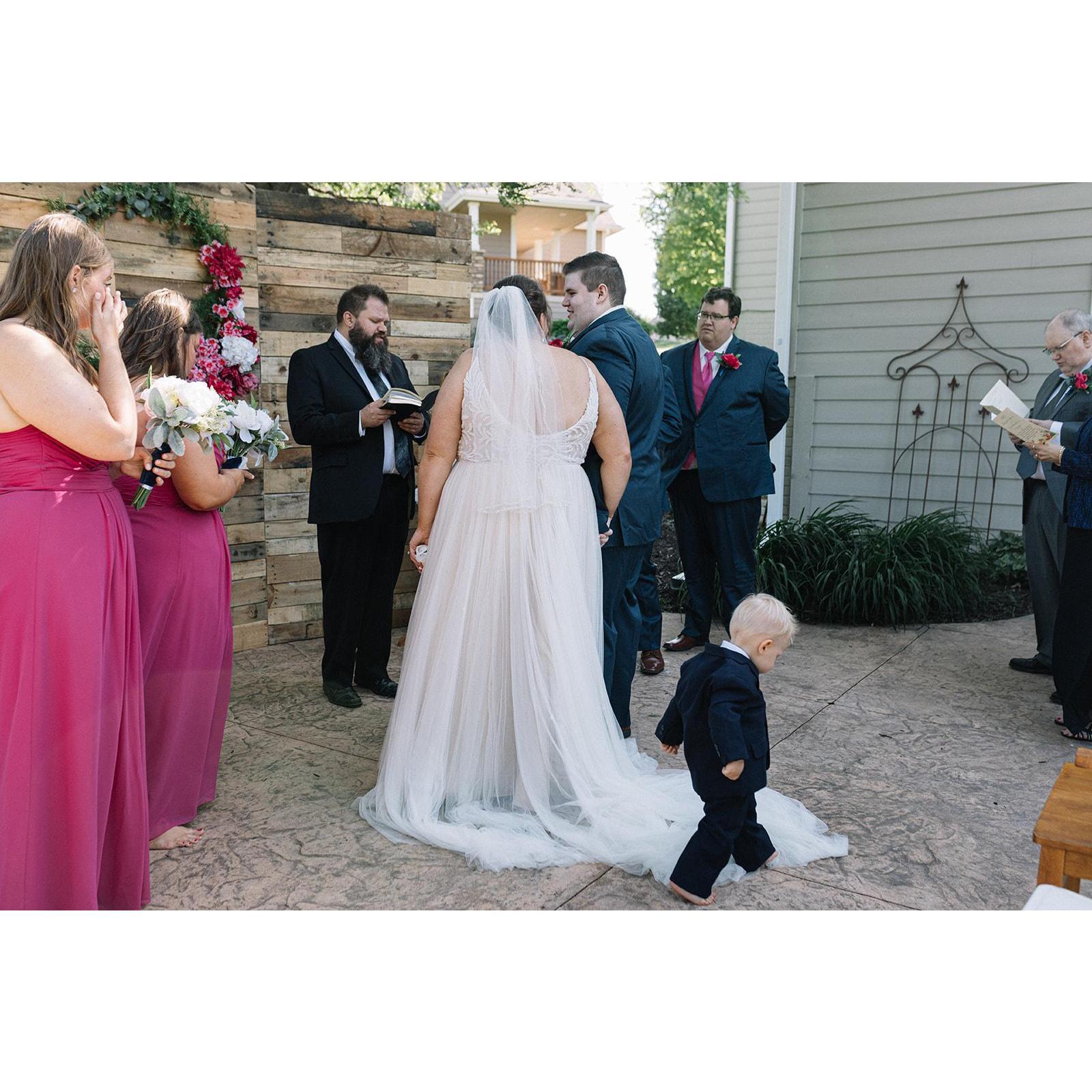 Again, the rogue ring bearer who did not approve of the loafers the bride chose for him to wear.