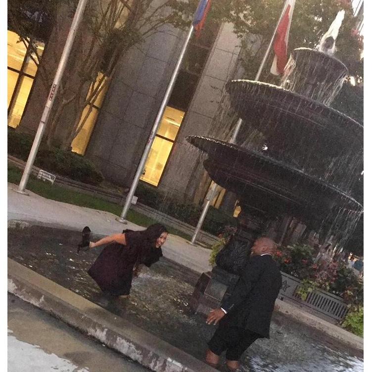 Splashing around at the end of our engagement shoot to cool off. We picked the hottest time of the year to do these!