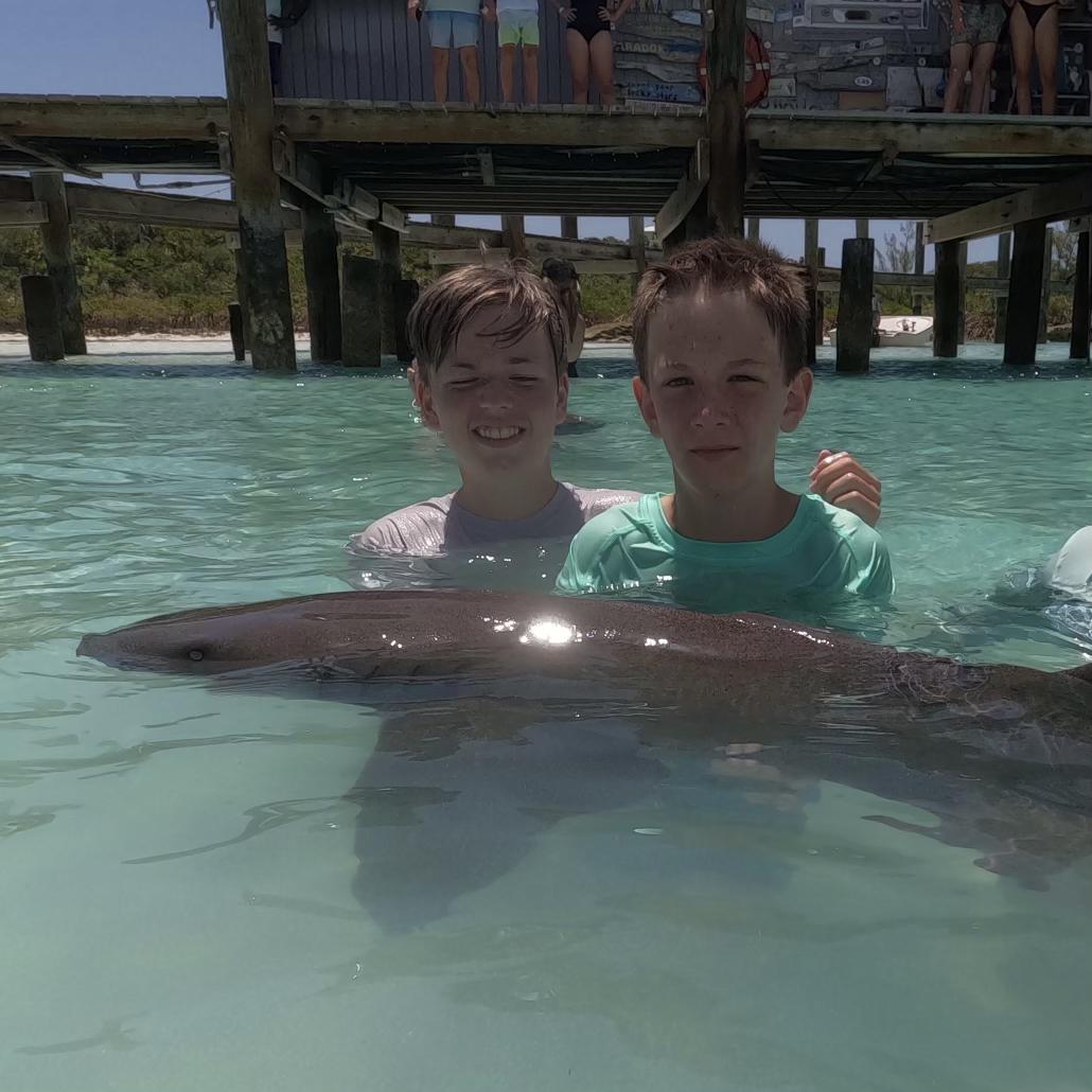 We got the boys into swimming with sharks:) Exuma 2022