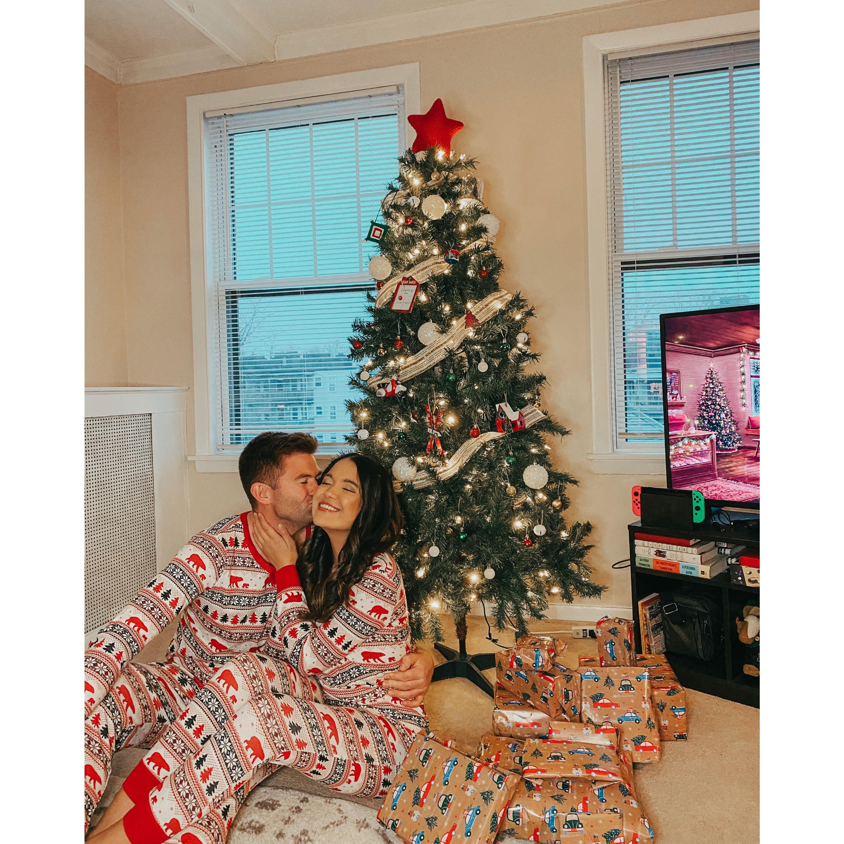 Celebrating Christmas together in our apartment with our annual matching Christmas pajamas.
