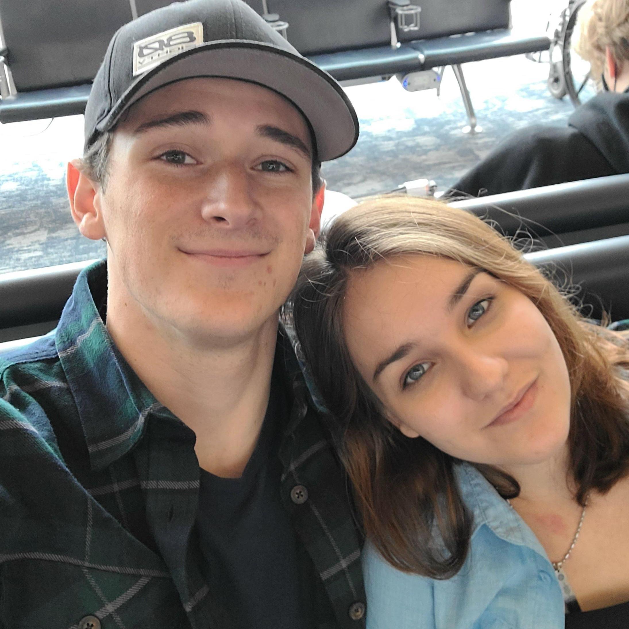 Ryan taking Abigail to the airport to fly back to TN. You can see the pain of being apart once again in this photo