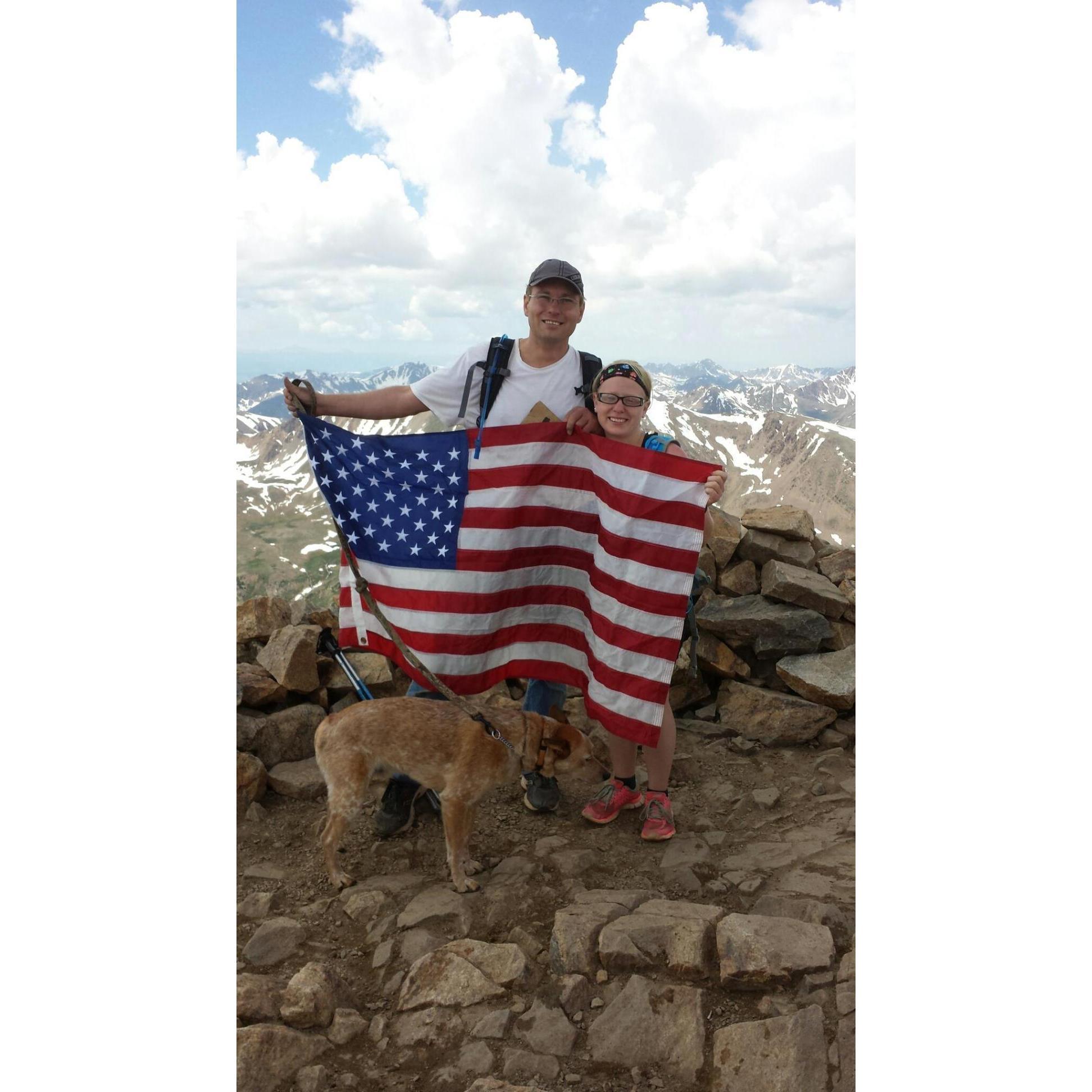 During our first camping trip together, we spent our first Fourth of July hiking Mount Elbert.
(At the top of Mount Elbert.  July 4th, 2015)