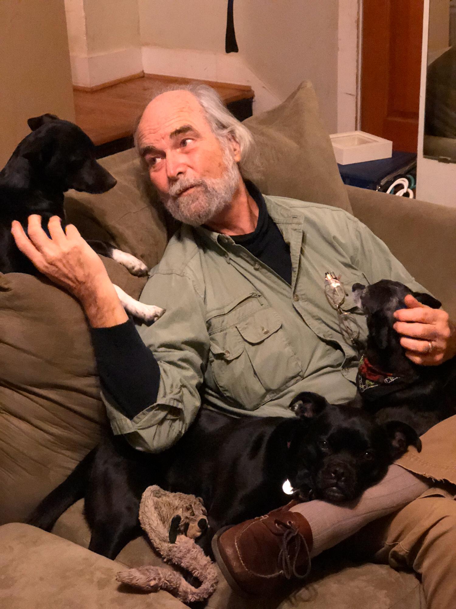 Davie’s Father Jim in a dog pile.