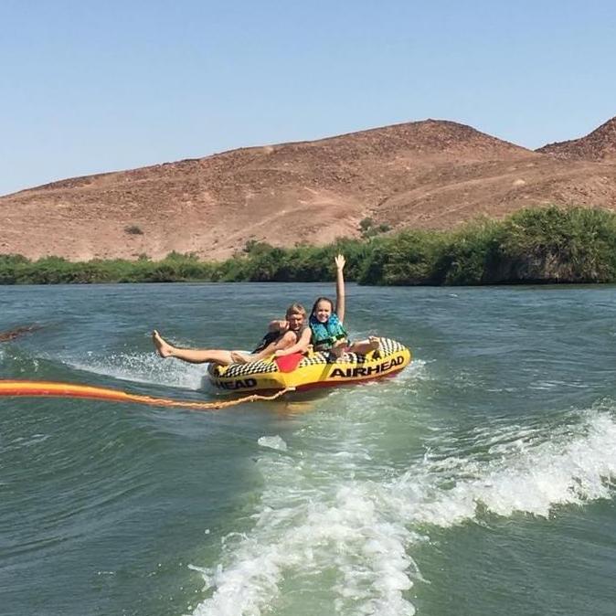 Ross and Erica enjoying his family’s boat on the river in Yuma.