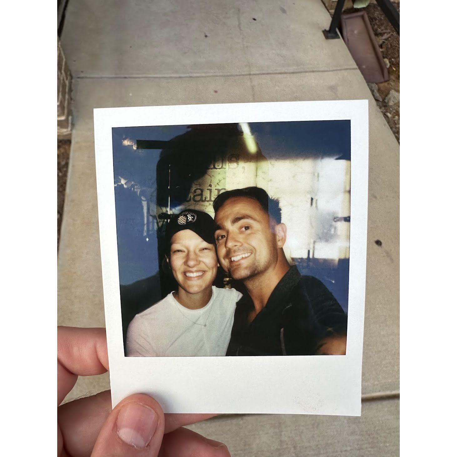 Our polaroid photo in the Denver airport prior to Travis deploying to Lithuania for 8 months.