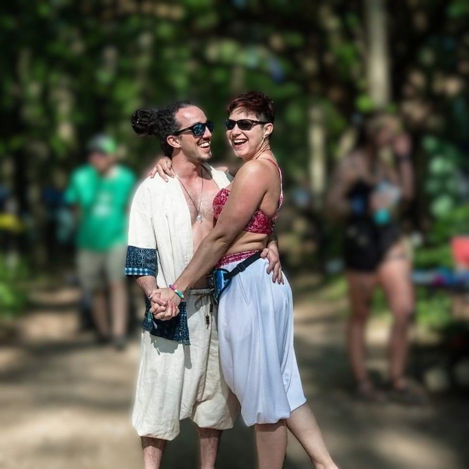 2023: Summer Camp. Tad making Raven laugh when a stranger took our picture. We love this photo.