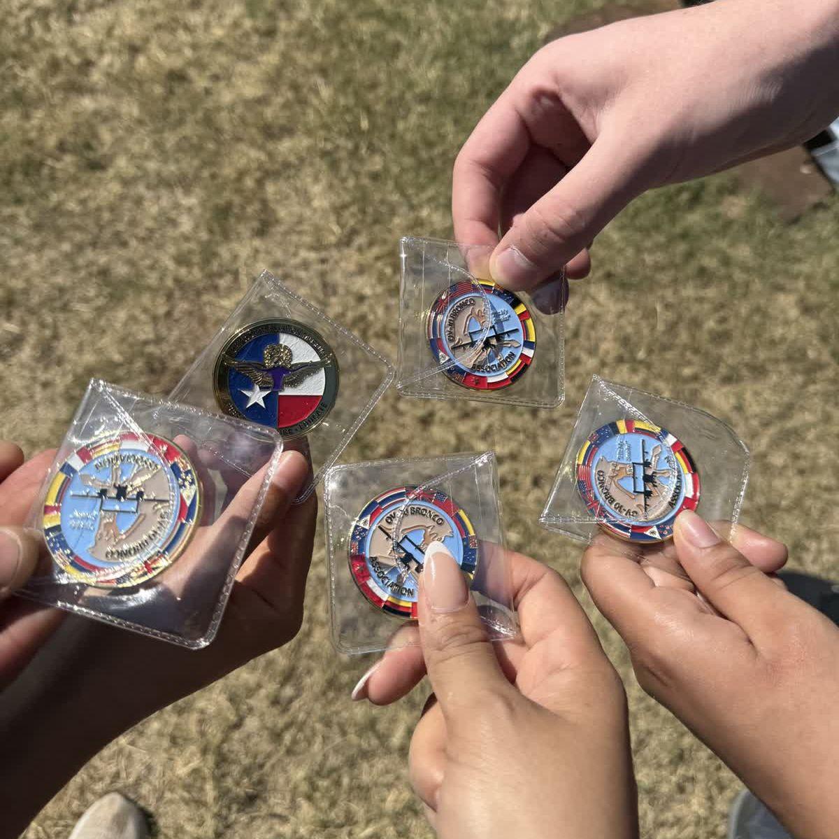 For our service project, we spent the day helping out at the Fort Worth Aviation Museum, and to top it off, they surprised us with challenge coins as a thank-you for our hard work!