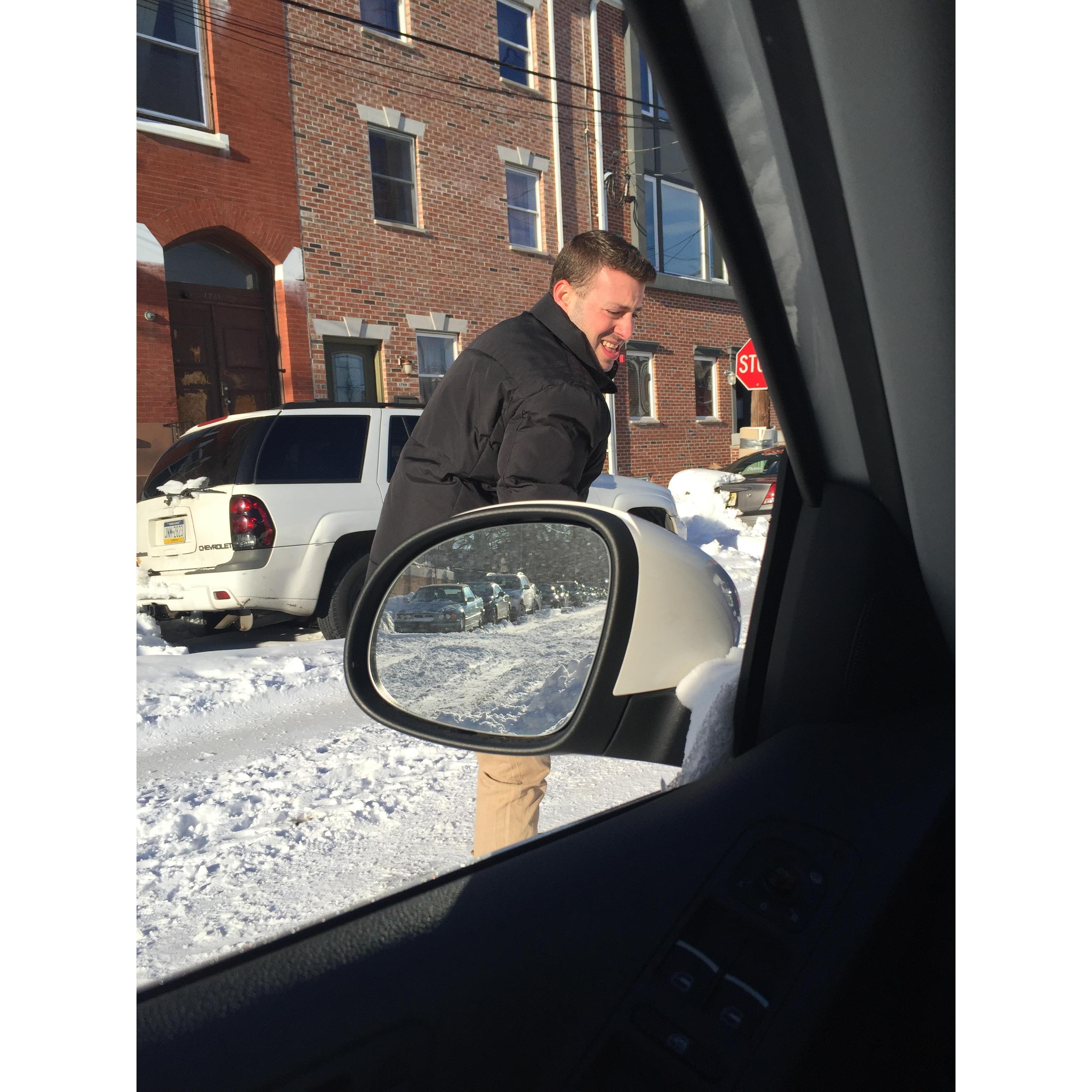 Scott shoveling my car out of the snow after one of our first dates...a keeper!