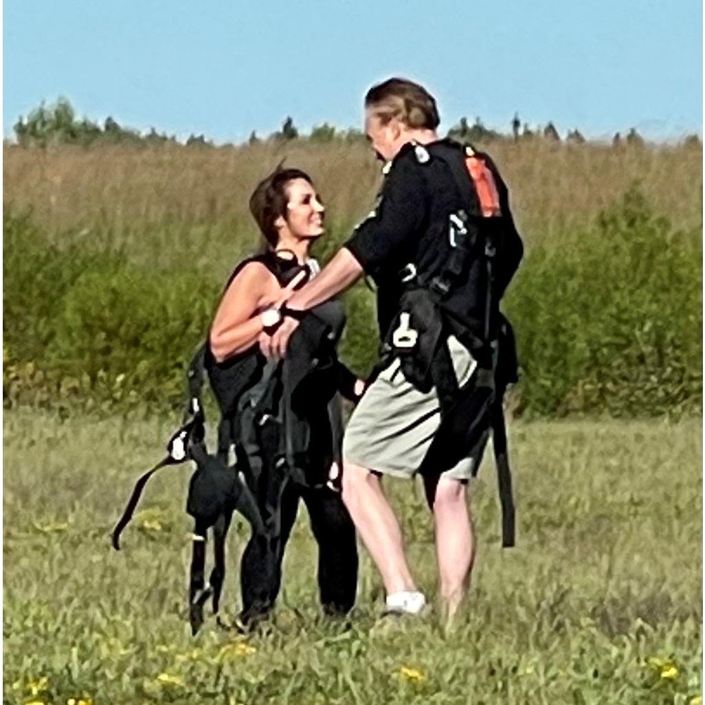 Celebrating the landing from our jump 10,000 in the air (Renee's first, Tim's third)