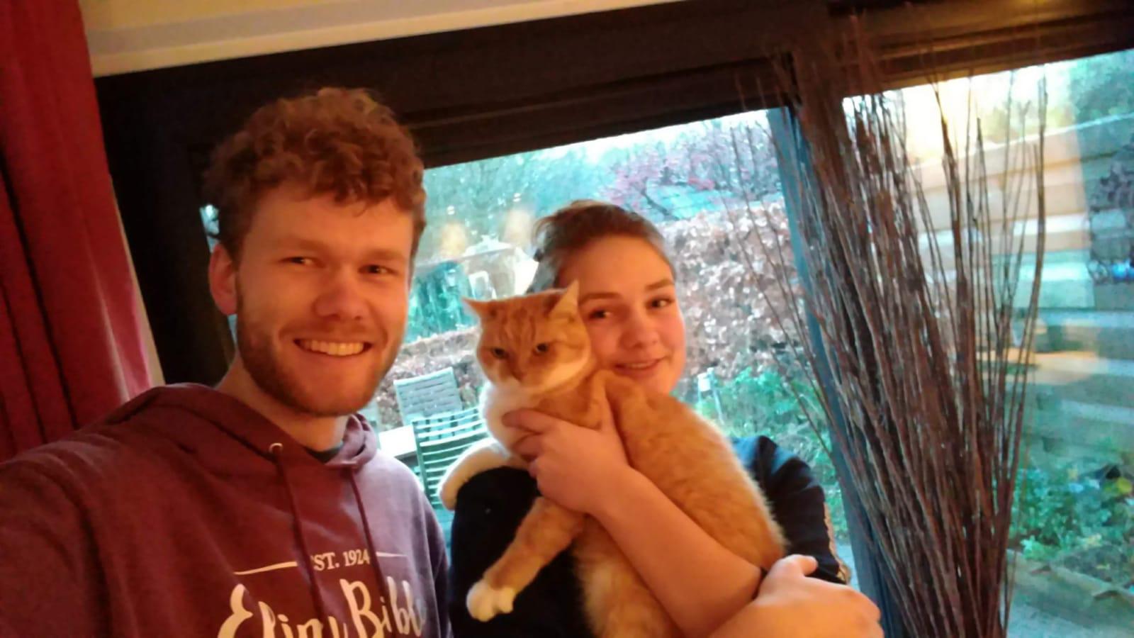 Michiel, his sister (Kirsten) and the family cat (Looky)