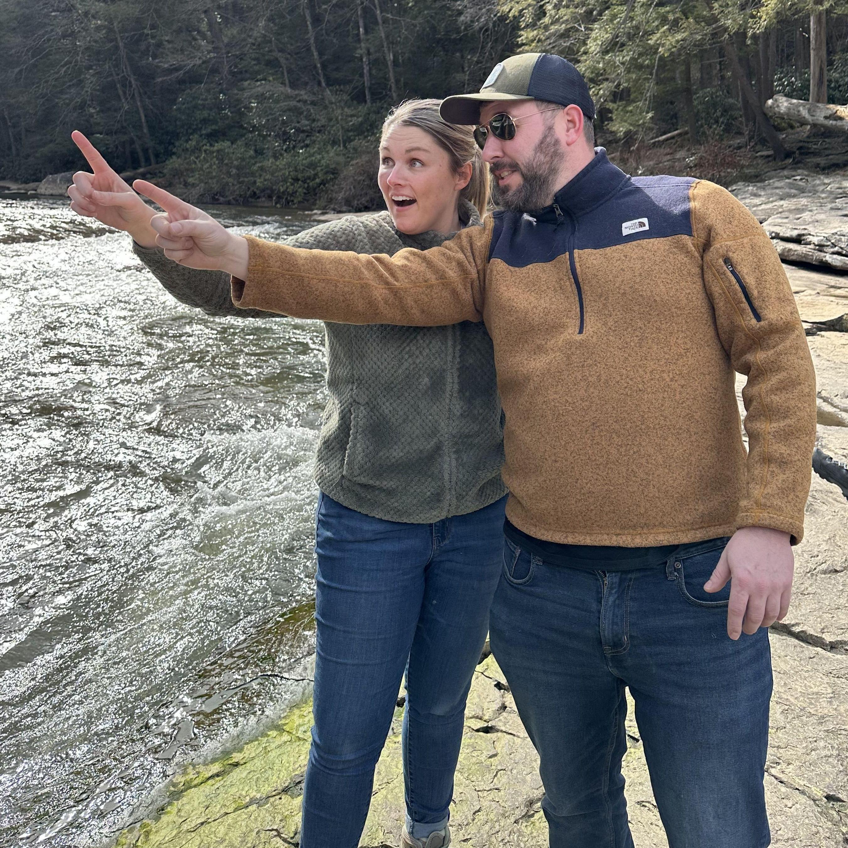 Probably pointing out a bird.