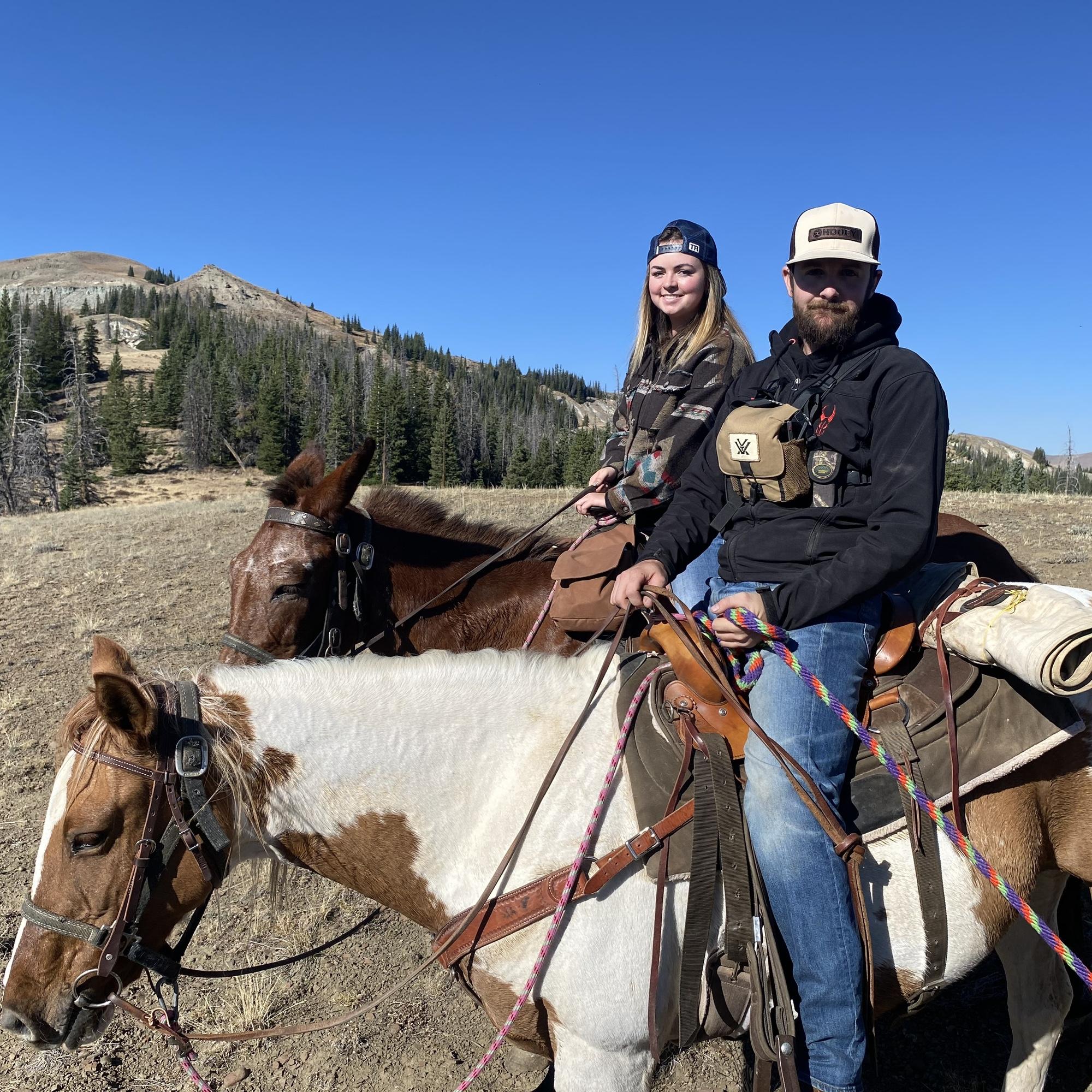 the second time i got him on a horse with me, he rode our mare hollywood, then proposed!