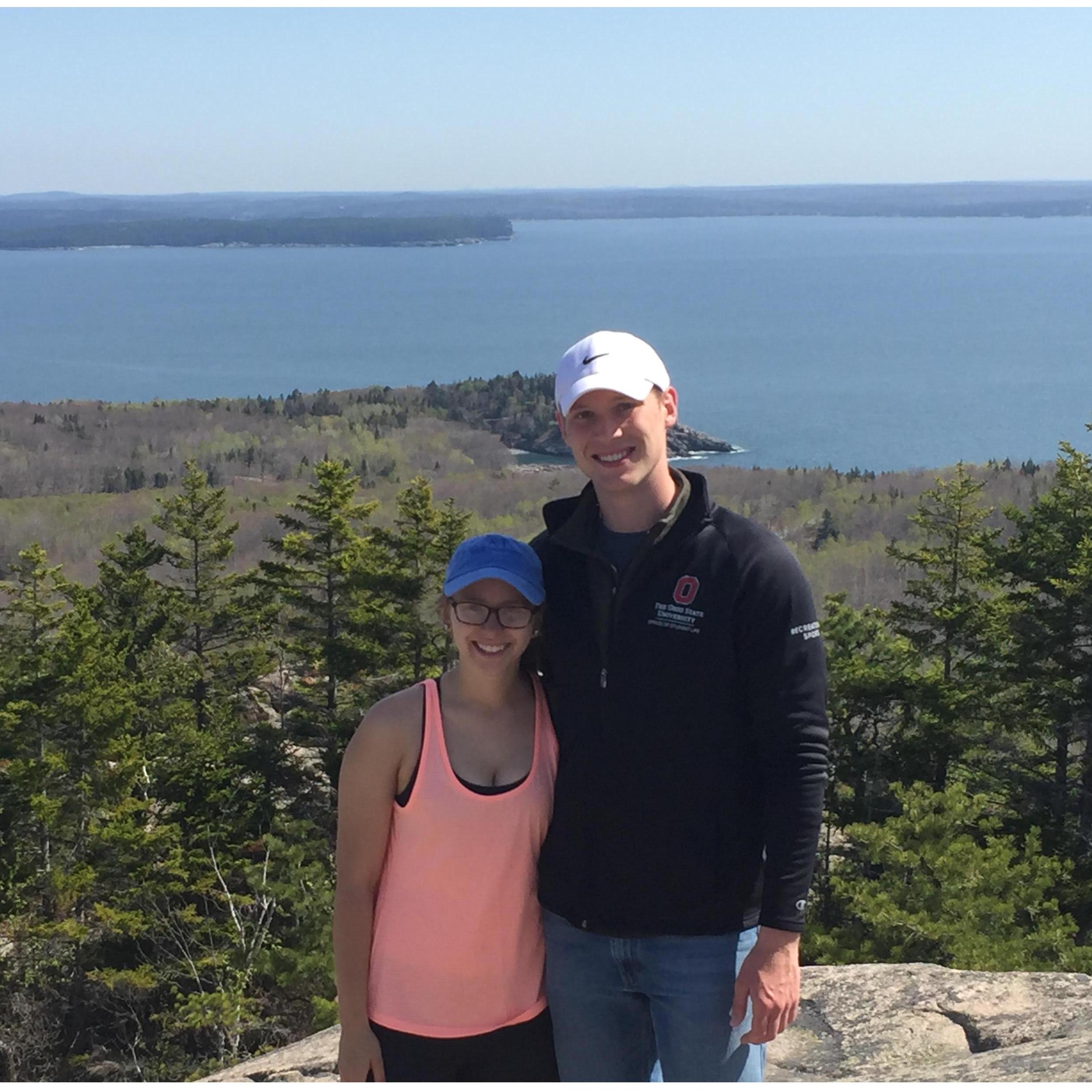Us at the peak of the Beehive Trail in Acadia National Forest in Maine.