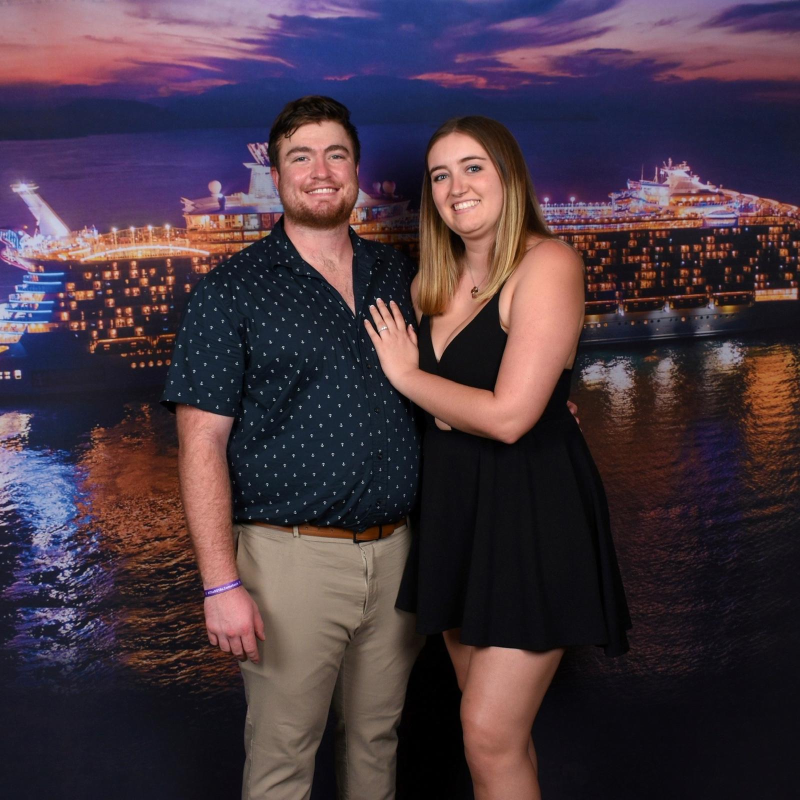 Us after we got engaged on the Symphony of the Seas in 2022