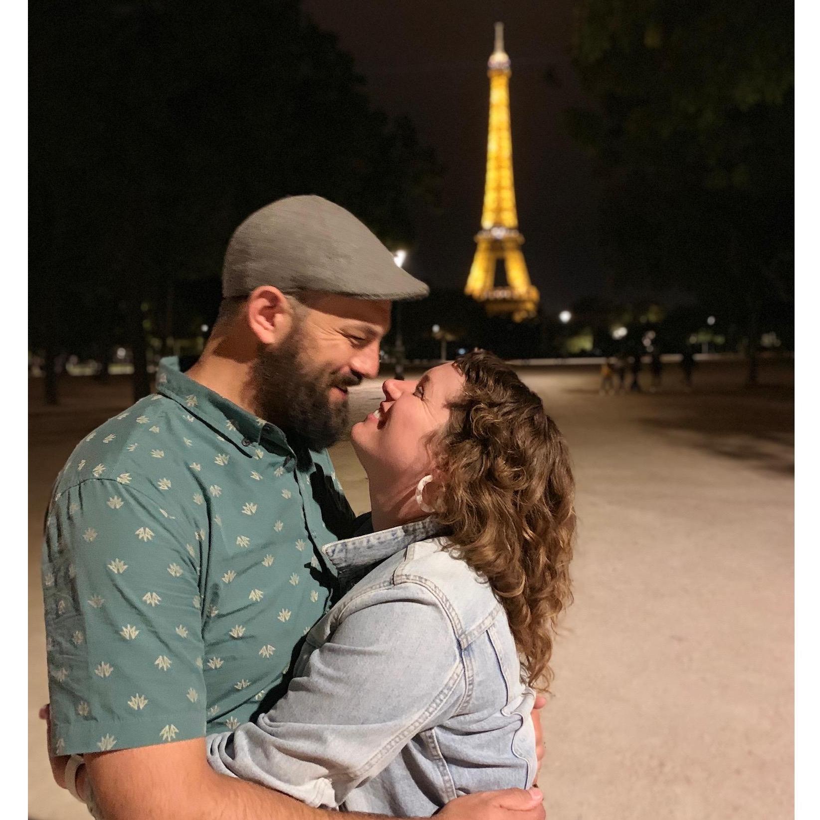 Our engagement: drinking champagne with family as the Eiffel Tower lit up.