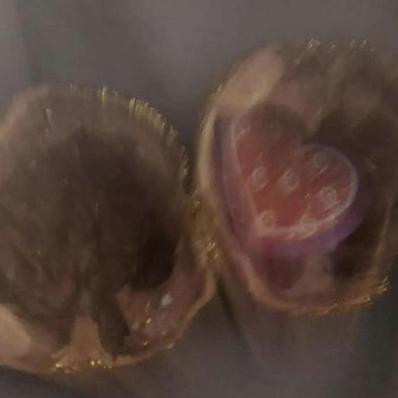 The bride gifts these Yule stockings. She learned this from church. The item inside is an oracle for the year. This was the year they started trying to marry. The groom proposed w/ one as a ring box.