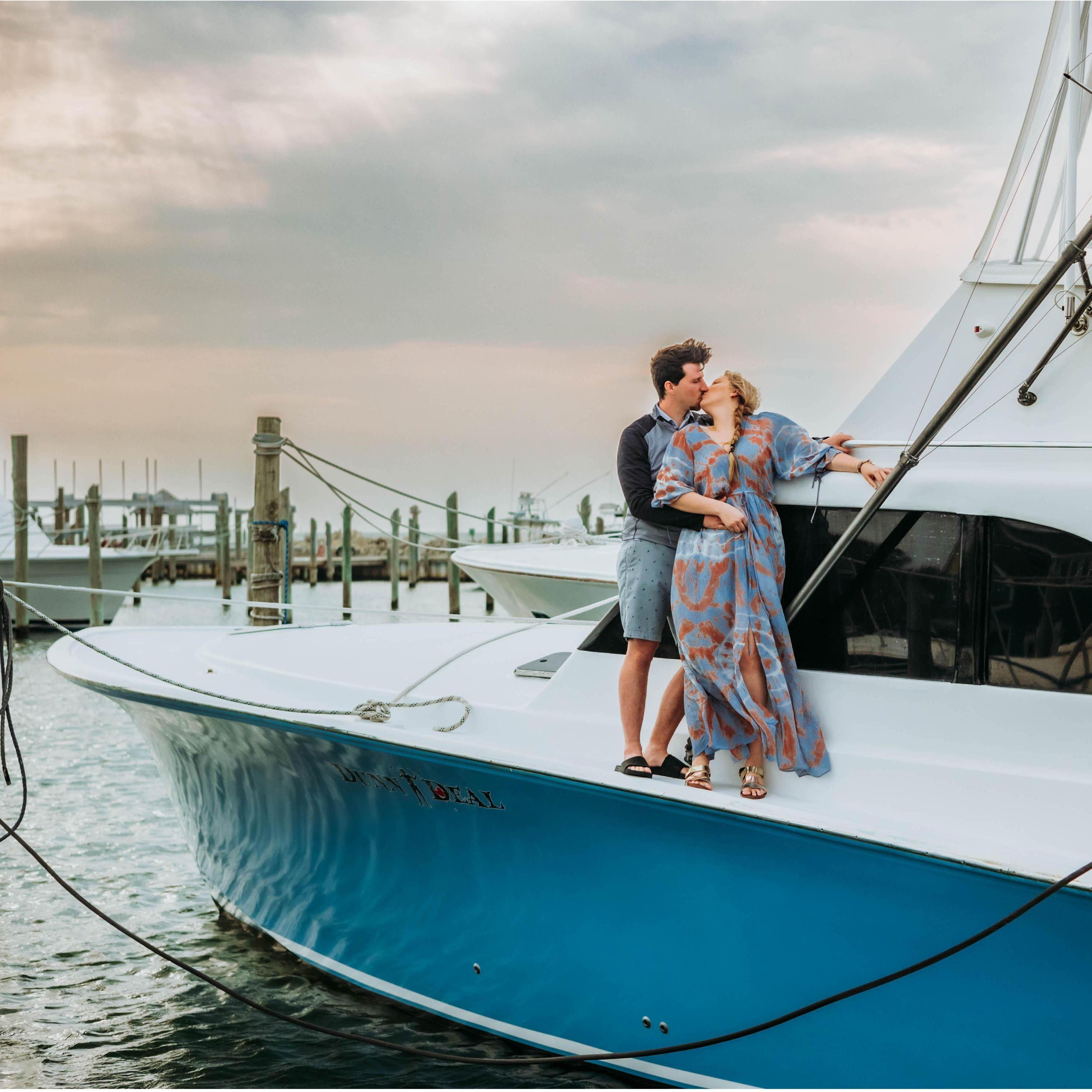 My sister and I saw a finishg charter named Dunn Deal Fishing two years ago and joked that one day Tom and I should get engaged on that boat. 
We didn't get engaged on it but we did get a picture!