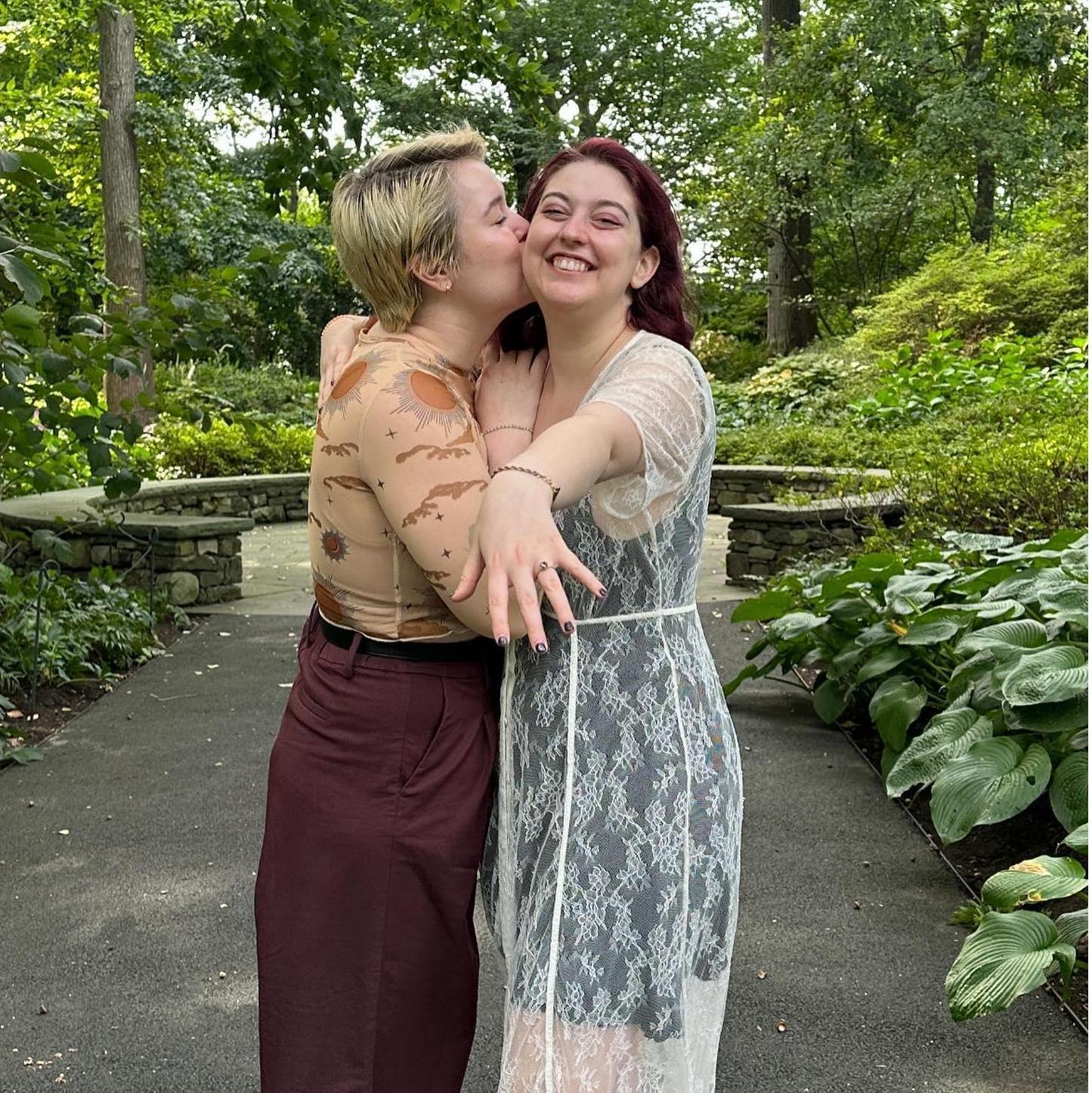 When Em said yes! T proposed to Em at the New York Botanical Garden.
